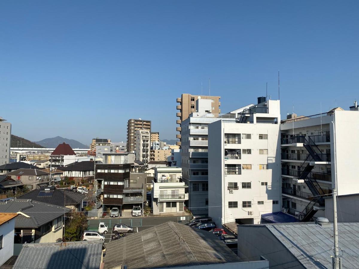 Pensión com inn Hiroshima Exterior foto